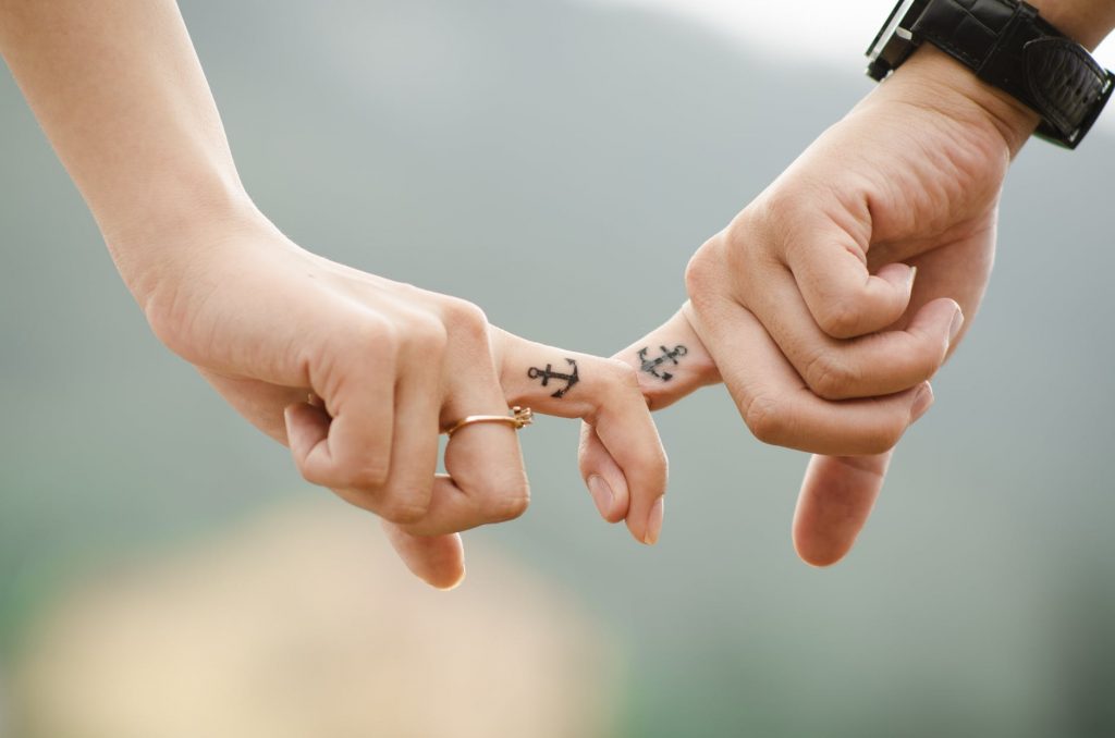 Finger tattoos with anchor design