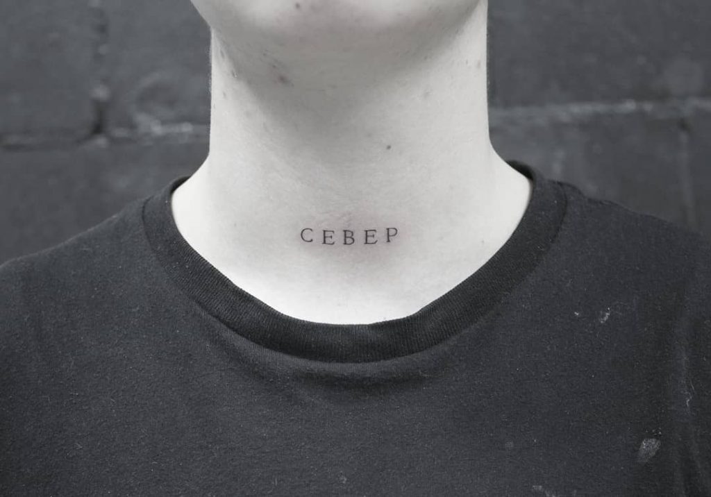 Small Single Needle Neck Tattoo